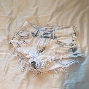 Distressed denim shorts